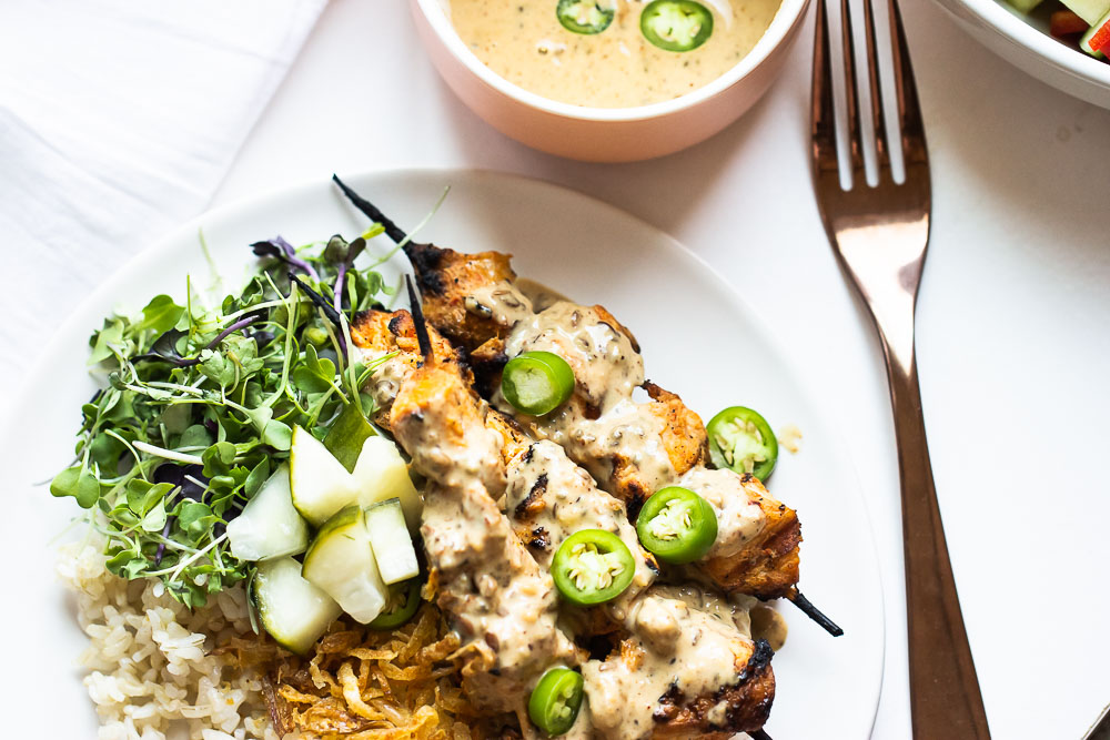 This Chicken Satay Bowl is easy to make and packs in a ton of flavor! Healthy and filling - all in one delicious bite!