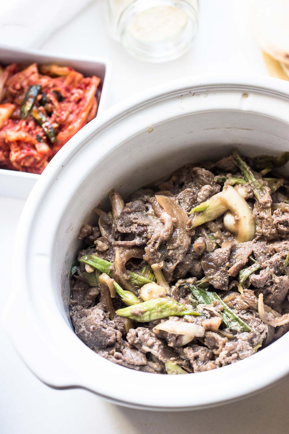 Slow Cooker Beef Tacos or Bulgogi Tacos are packed with flavor, no messy cleanup, and zero effort! Seriously, it doesn't get easier than that! And the best part, you can make it in a slow cooker or on a grill.