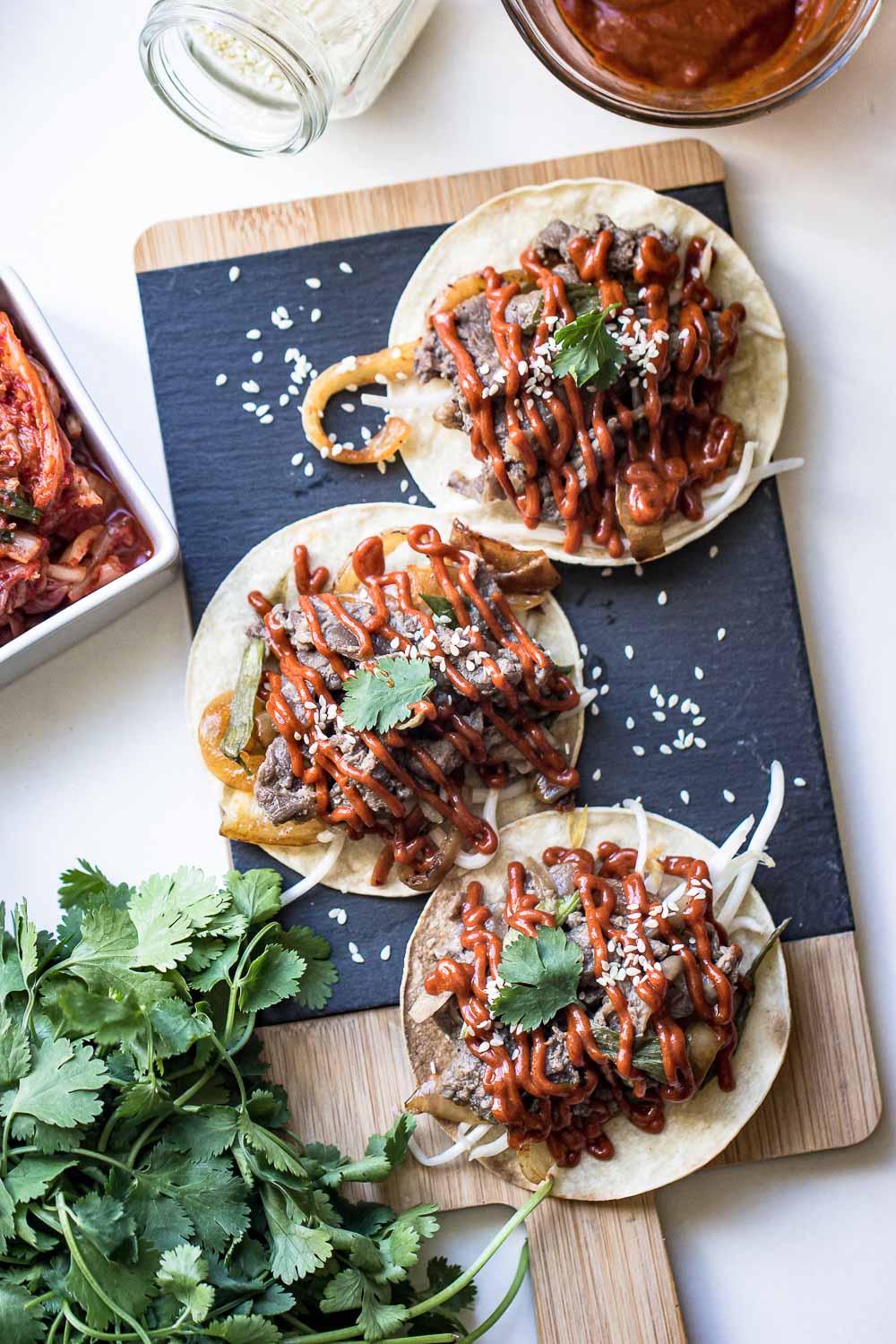 Slow Cooker Beef Tacos or Bulgogi Tacos are packed with flavor, no messy cleanup, and zero effort! Seriously, it doesn't get easier than that! And the best part, you can make it in a slow cooker or on a grill.