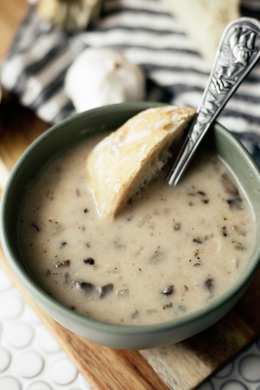 Creamy mushroom soup is comfort in a bowl; it's creamy, rich and perfect for warming up with on a winter day.