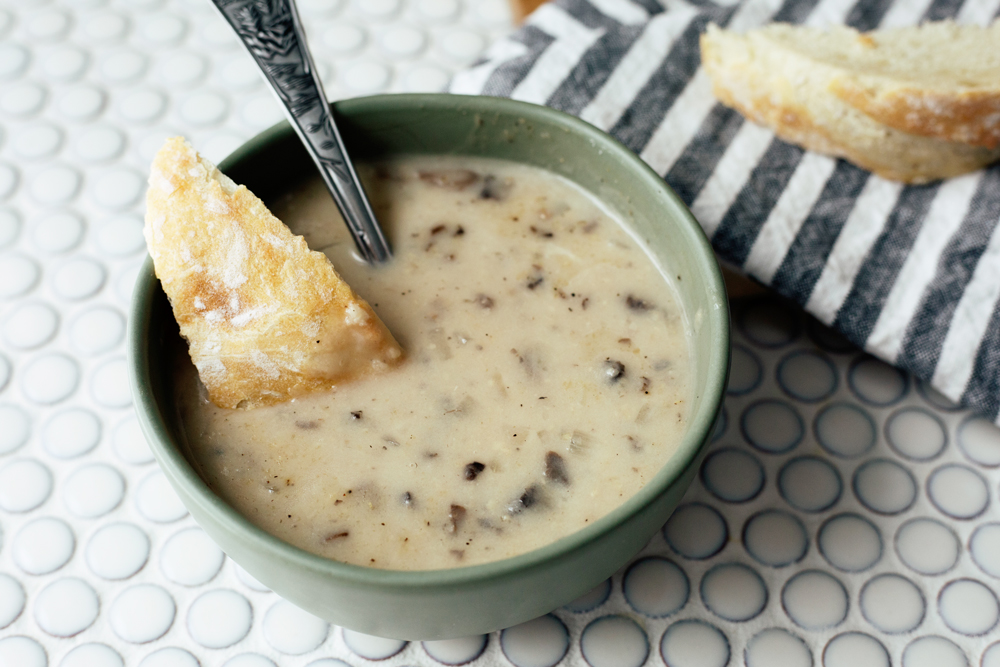 Creamy mushroom soup is comfort in a bowl; it's creamy, rich and perfect for warming up with on a winter day.