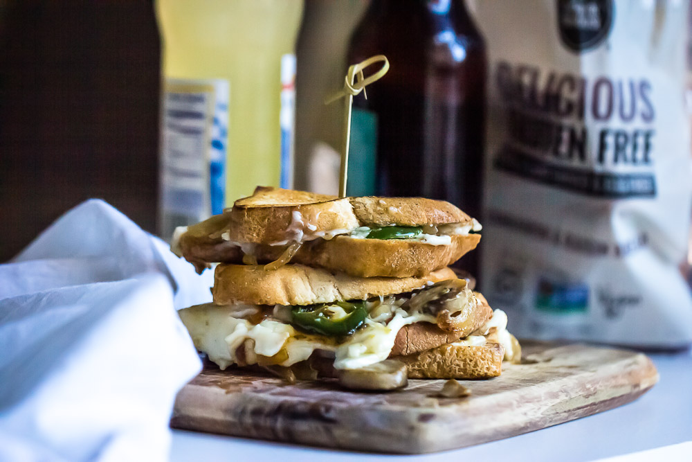 Grilled Mushroom Toast. This gluten-free comfort food brings together the earthy flavors of grilled mushrooms, roasted garlic and melted cheese for the perfect breakfast, lunch, dinner side, and National Toast Day.