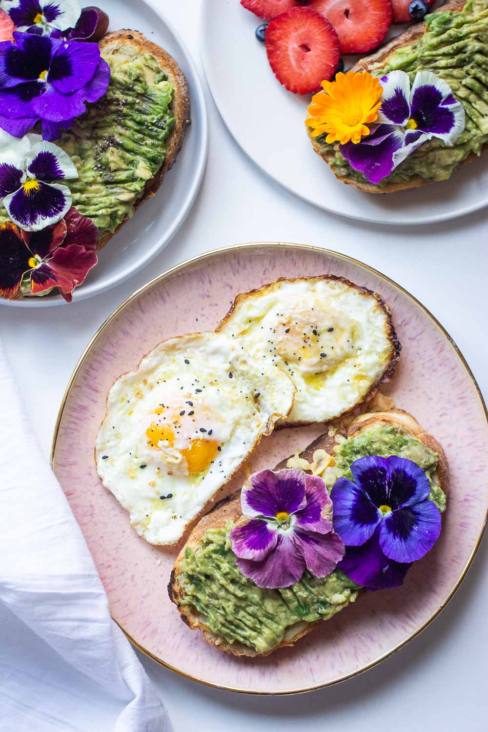 Upgrade your avocado toast to this Avocado Toast Grilled Cheese. Creamy avocado over buttery garlic bread and melted cheese. This toast is so simple to make but brings out the most amazing flavors in every bite.