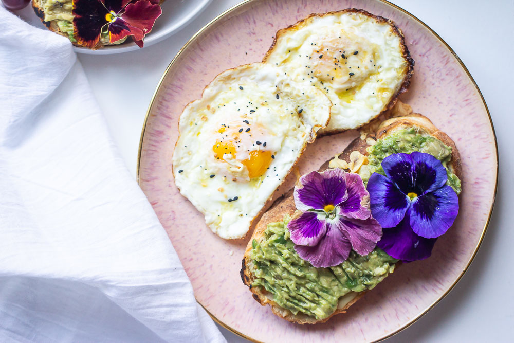 Upgrade your avocado toast to this Avocado Toast Grilled Cheese. Creamy avocado over buttery garlic bread and melted cheese. This toast is so simple to make but brings out the most amazing flavors in every bite.