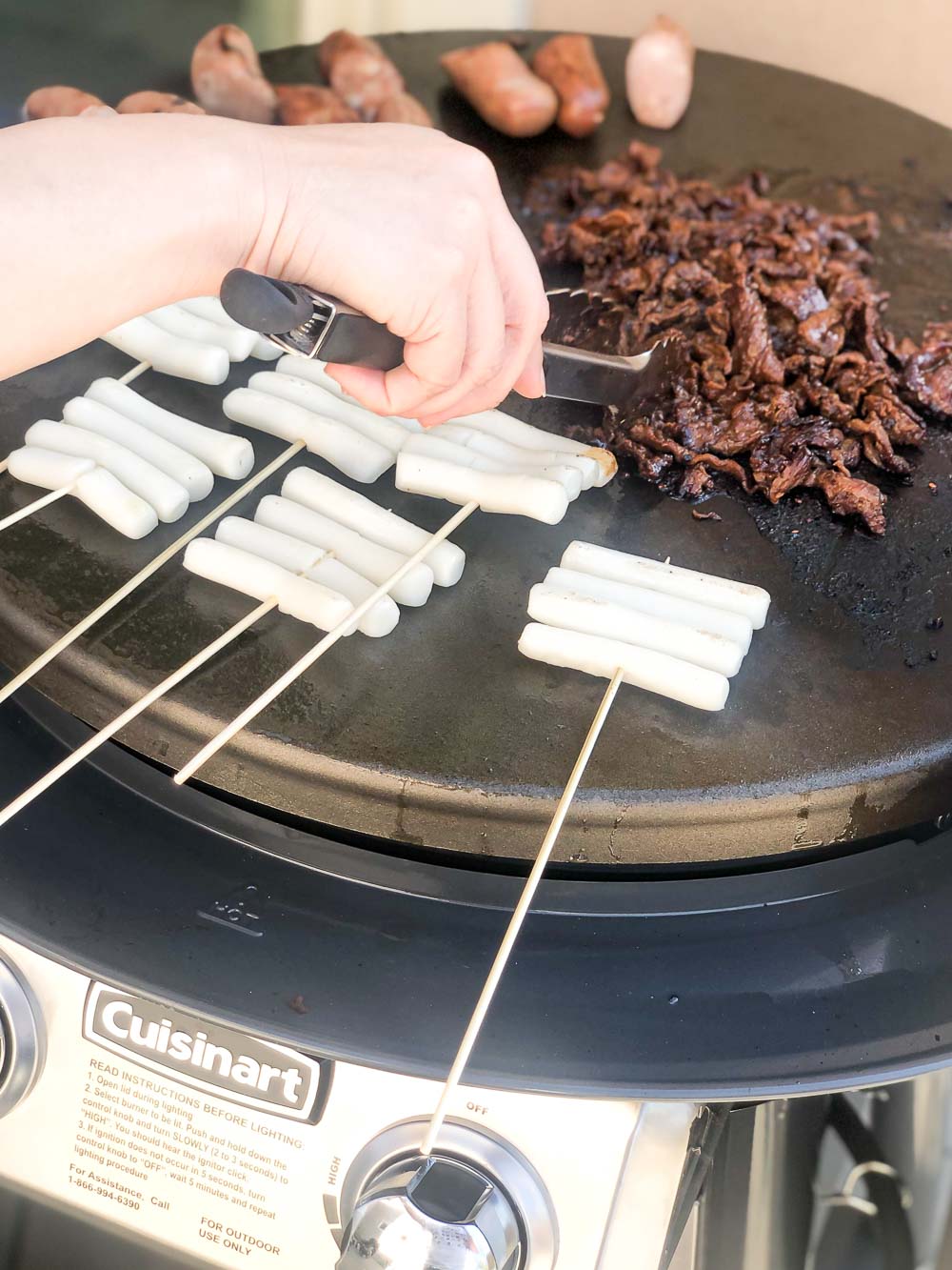 This grilled tteokbokki is a popular Korean street food that comes in the form of a sweet and chewy rice cake. A delicious Asian sauce soaks these rice cakes (or more appropriately, rolls) once they’ve been grilled to perfection. These spicy, Korean rice cakes are usually about the size of a thumb and have the perfect light crisp on the outside with a delightfully chewy center.