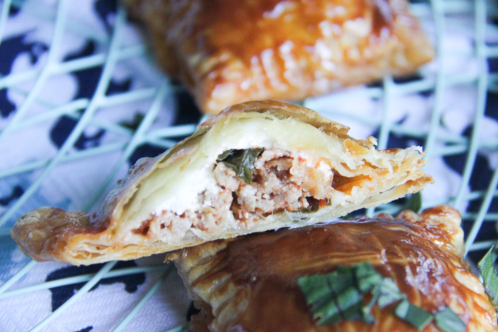 Italian hand pies. Scrumptious sausage filling. Completely irresistible. Totally addictive. These dainty hand pies are full of flavor and gooey cheese and one of the most delightful pies you can make any time.