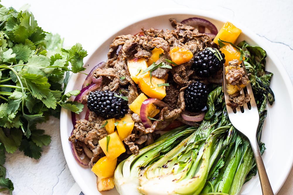 Vietnamese Grilled Steak with Peach Salsa. A fresh take on a Vietnamese classic grilled steak over fresh peach salsa. Fast, fresh and full of flavor!