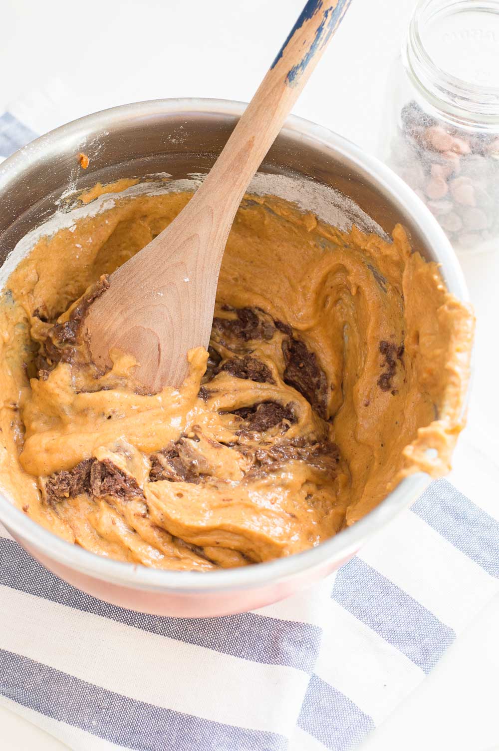 These Double Chocolate Pumpkin Muffins are a great way to enjoy pumpkin spice season. The muffins are super easy to make and are ready in 30 minutes. Deliciously moist, chocolatey, and downright decadent which make this recipe the best chocolate pumpkin muffins.