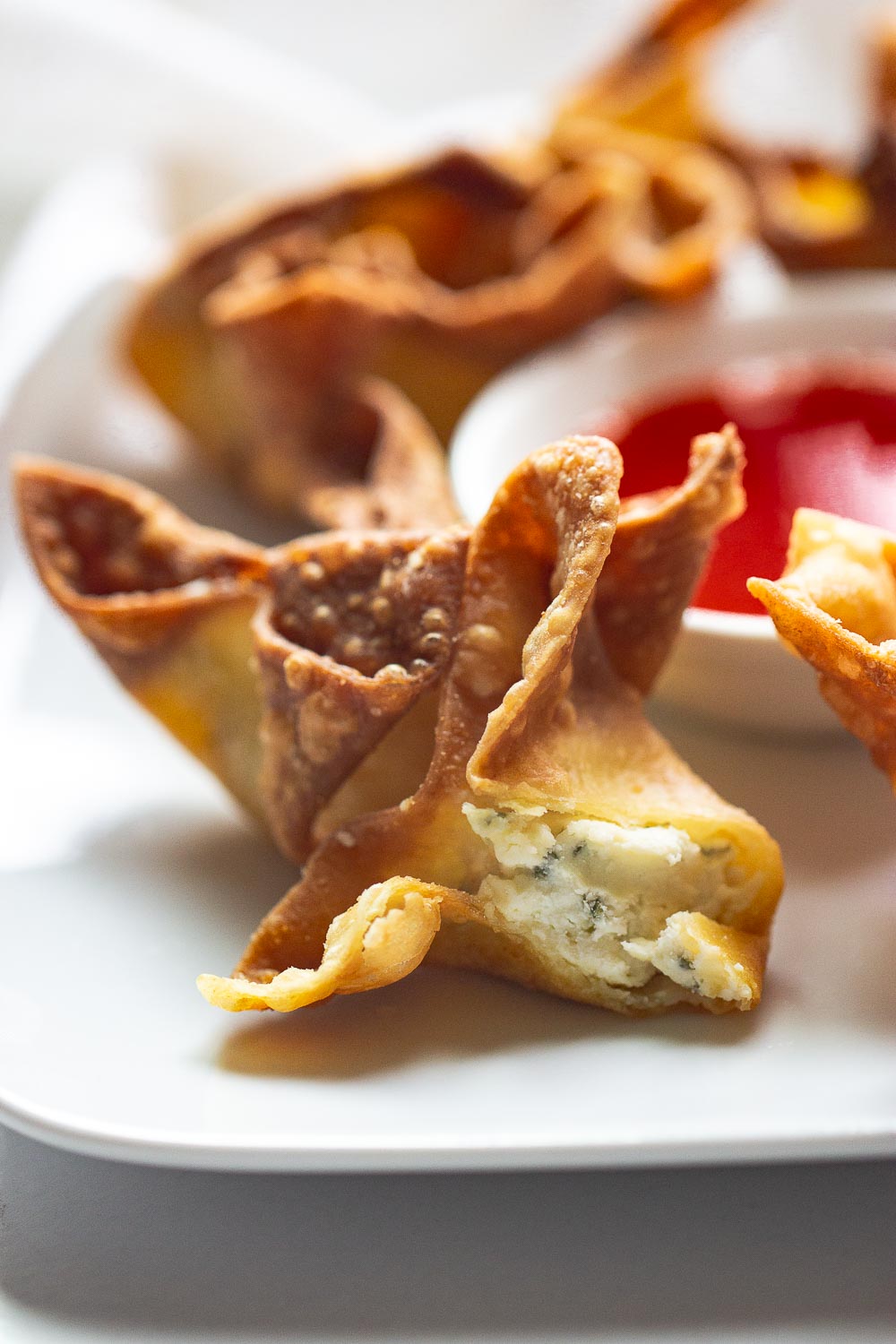 These creamy cream cheese and crab rangoons are so easy to make at home. A fake-out take-out favorite and perfect for snacking on game days!