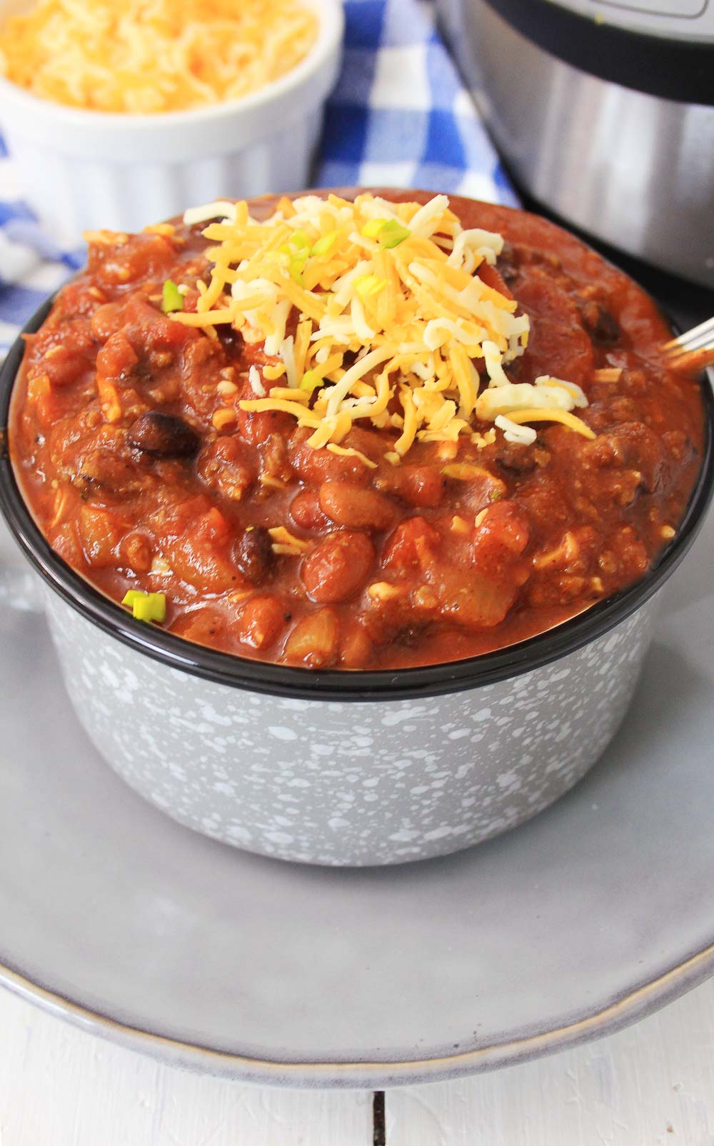 Three Bean Chili is a delicious weeknight meal and awesome as leftovers. Made in an Instant Pot in less than 30 minutes, this chili is hearty, full of flavor, and easy to make.