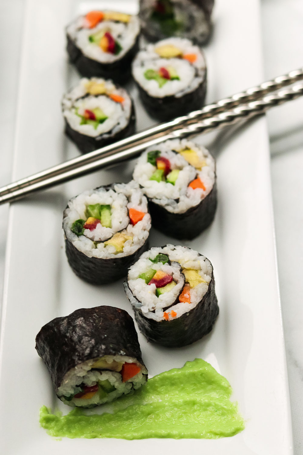 This easy vegan sushi recipe is the perfect recipe for a date night in! It’s easy, delicious, and can be made so many different fillings.