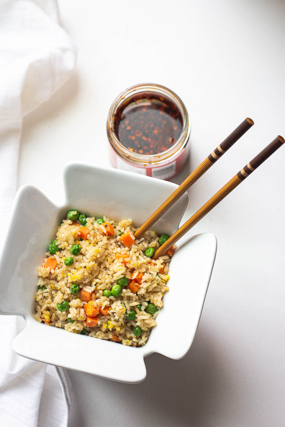 This easy yang chow fried rice (Yangzhou Fried Rice) recipe is the BEST. It’s quick and easy to make, customizable with any of your favorite mix-ins, and so irresistibly delicious.