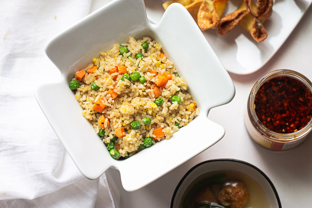This easy yang chow fried rice (Yangzhou Fried Rice) recipe is the BEST. It’s quick and easy to make, customizable with any of your favorite mix-ins, and so irresistibly delicious.