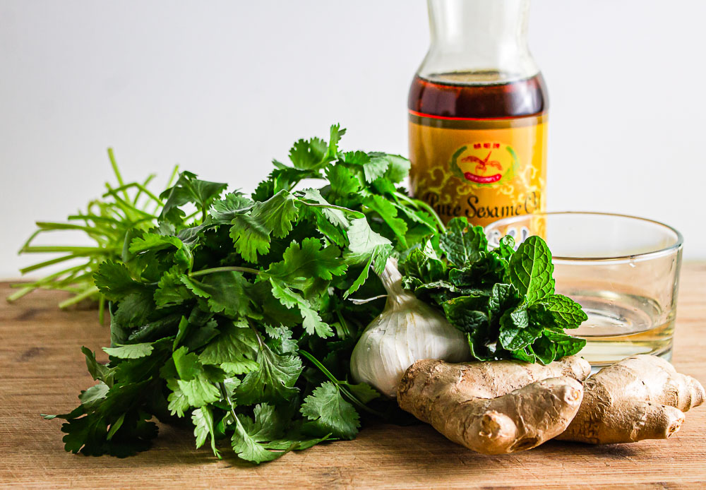 Homemade Chicken Spring Rolls with Cilantro Sauce is easy to make, refreshing, and make a delicious lunch, dinner, or snack on-the-go.