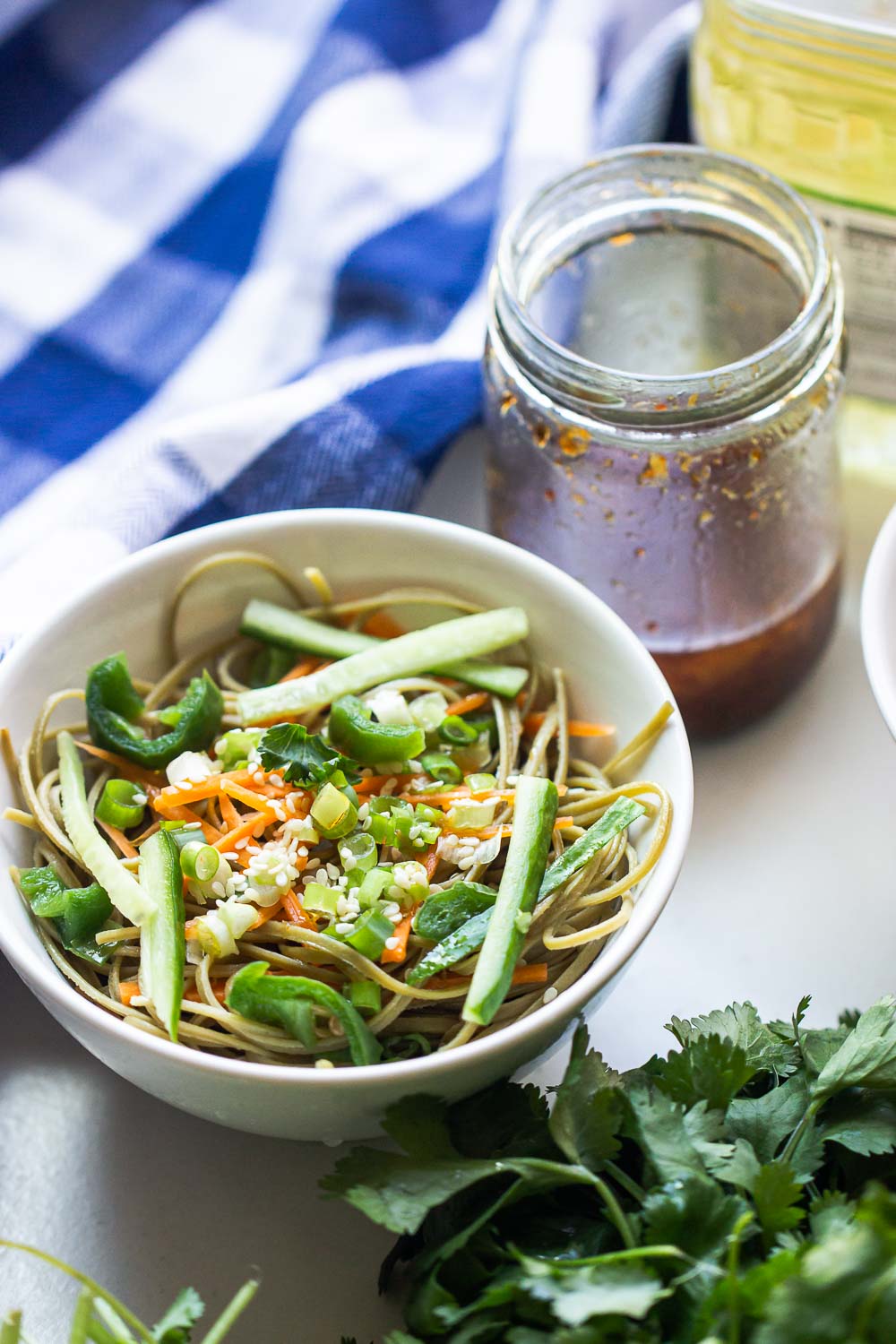 When life gives you instant ramen, turn it into Spicy Ramen Noodle Salad.  This 15-minute salad recipe uses very simple ingredients, including soybean oil. Soybean, you said? Yep, soybean oil. You’d be surprised how rich and delicious the end result is.  